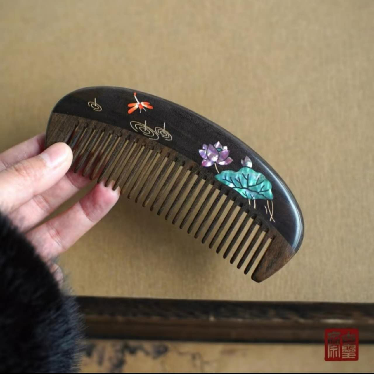 Dark wood comb with lotus, dragonfly and shell inlay