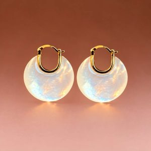 Round mother-of-pearl disc earrings with gold-tone hoop fittings